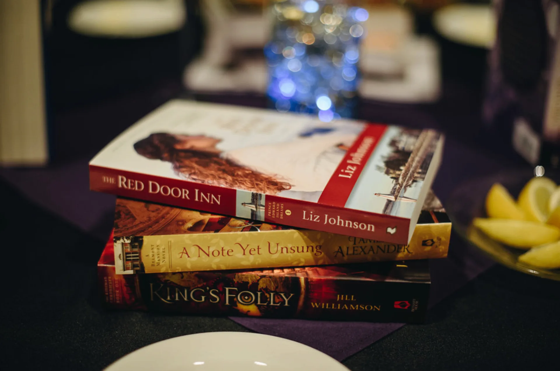 Stack of 2017 Christy Award Historical Fiction Finalist novels including A Note Yet Unsung
