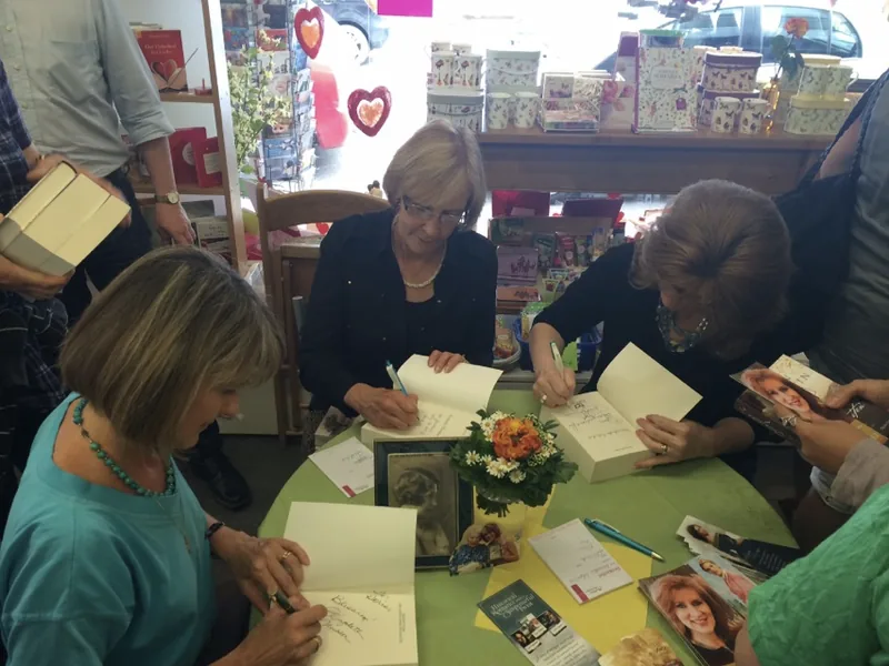 Signing books on 2014 Germany Book Tour with Elizabeth Musser & Lynn Austin
