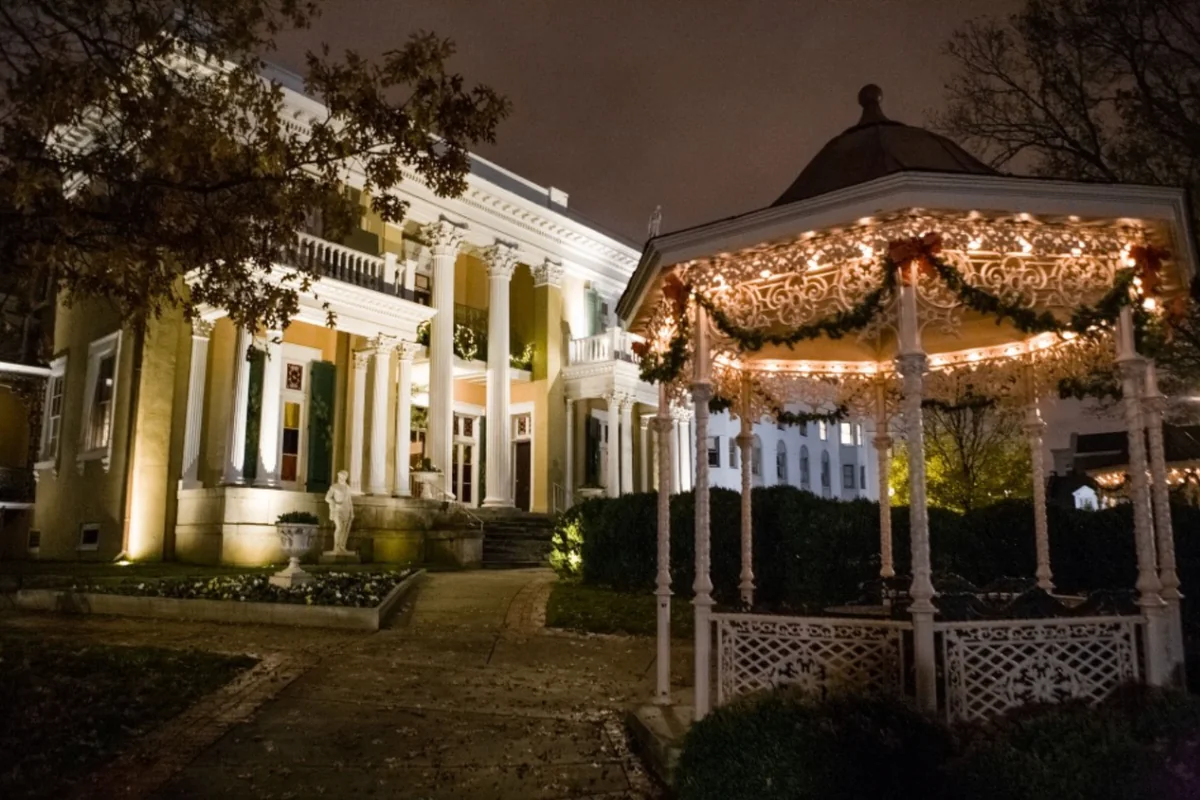 Belmont Mansion exterior lit at night during the Southern Mansion Reader Weekend