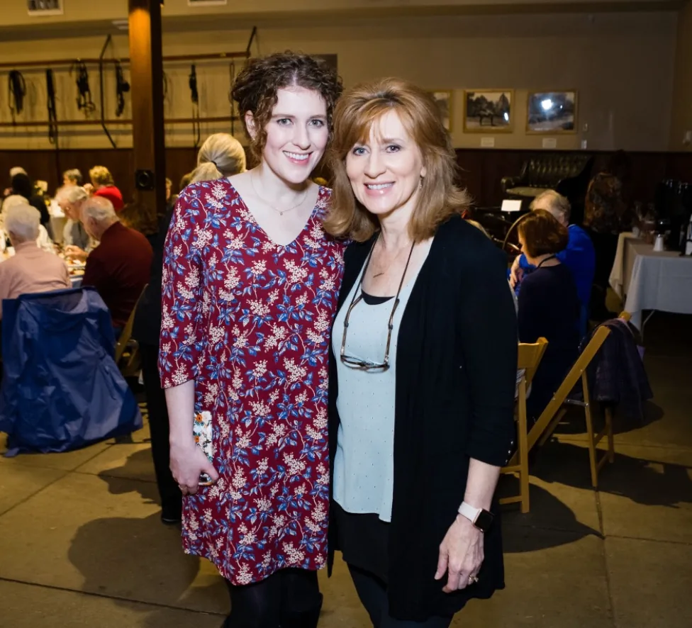 Tamera Alexander posing with an attendee during the Southern Mansion Reader Weekend