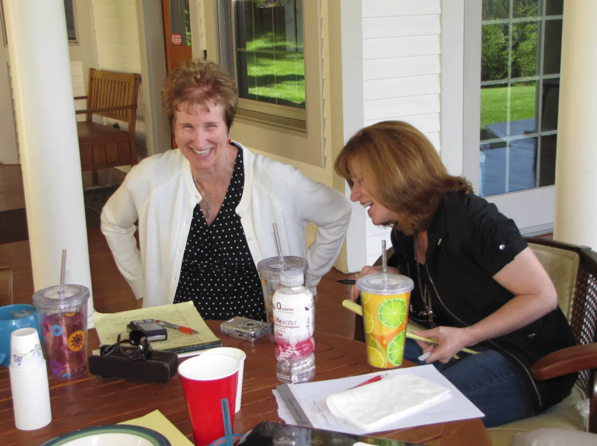 Coeur d'Alene Sisters writing retreat on the porch.