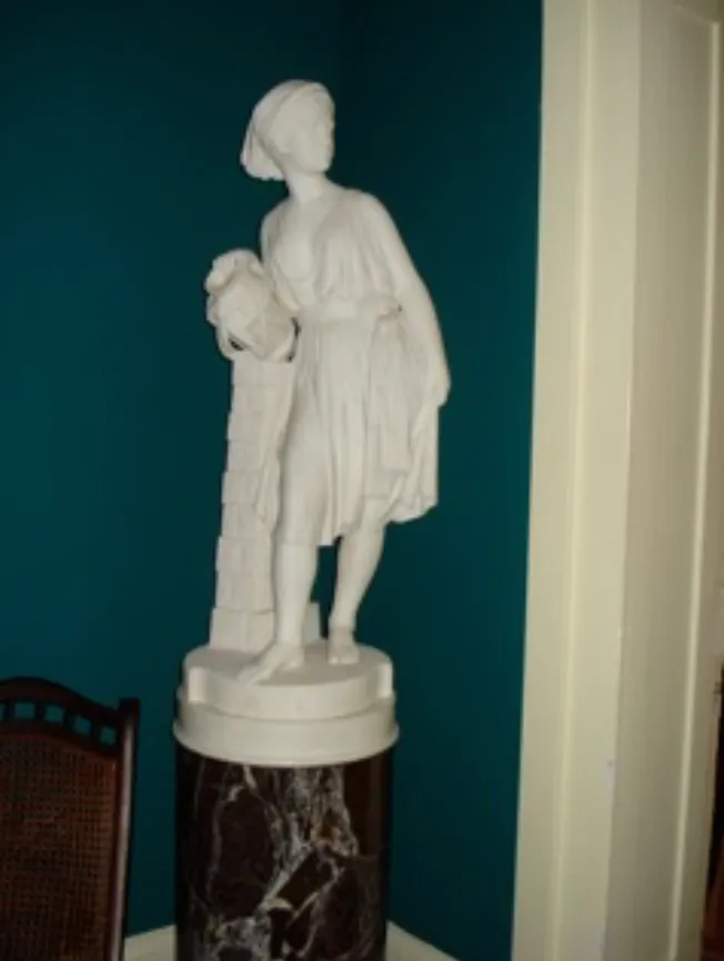 Rebecca at the Well statue by C.B. Ives displayed in Belmont Mansion's library.