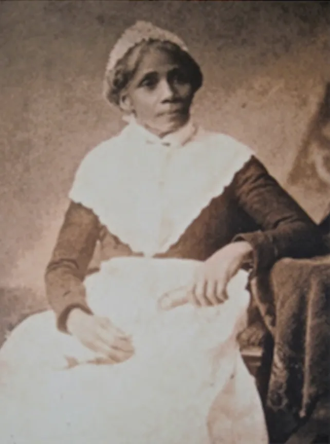Susanna Carter, head cook and housekeeper at Belle Meade Plantation, in a formal seated portrait.
