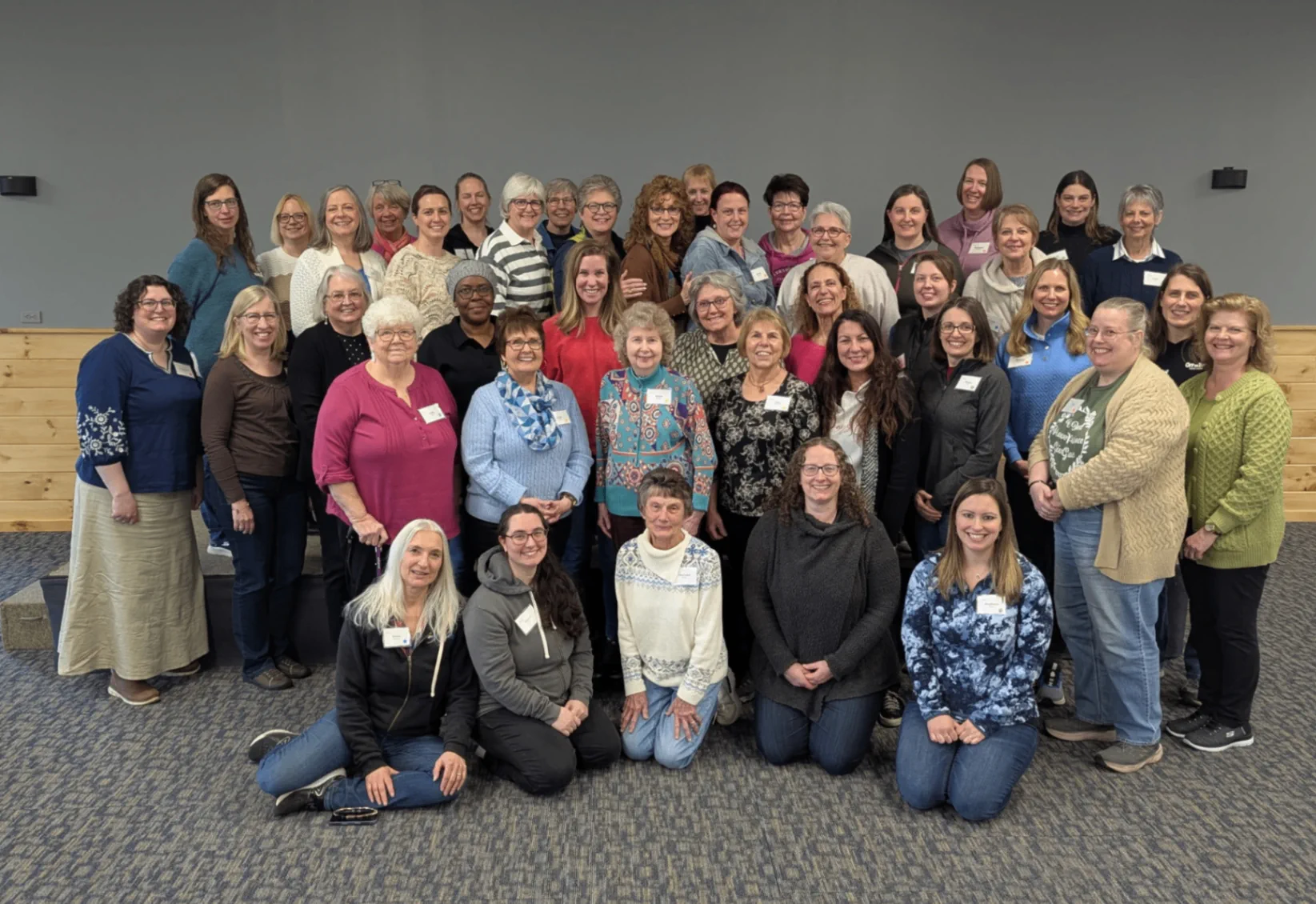 A large group photo from the Perinton Community Church Women's Retreat in Penfield, New York.